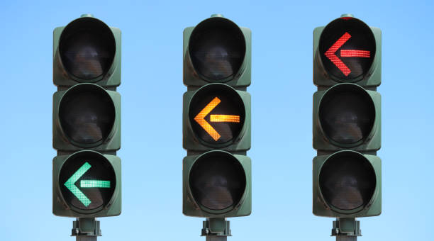 Traffic light sequence isolated Set of three traffic lights with the green, yellow and red light on. Sequence of a traffic light with left turn arrow isolated in the sky seen from the front. blue yellow lights stock pictures, royalty-free photos & images