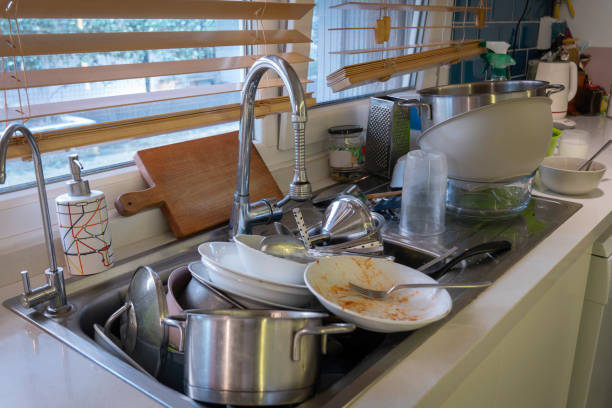 istock The messy kitchen after the day's meal. 2165435889