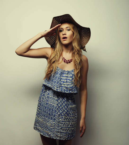 istock woman in  straw summer hat 2165436212