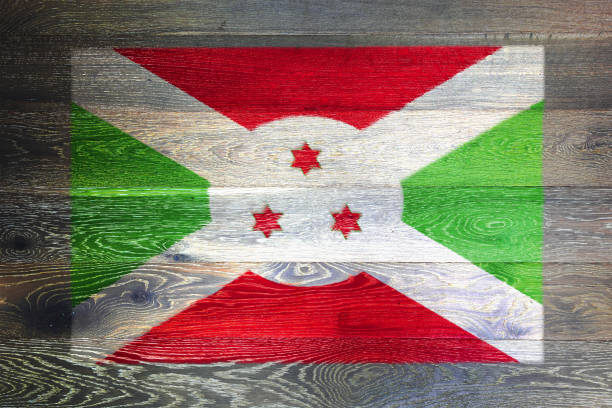 Burkina Faso Flag on cracked wall background.