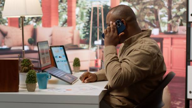 istock Entrepreneur reviewing statistics data on a laptop remotely from his house 2165443540