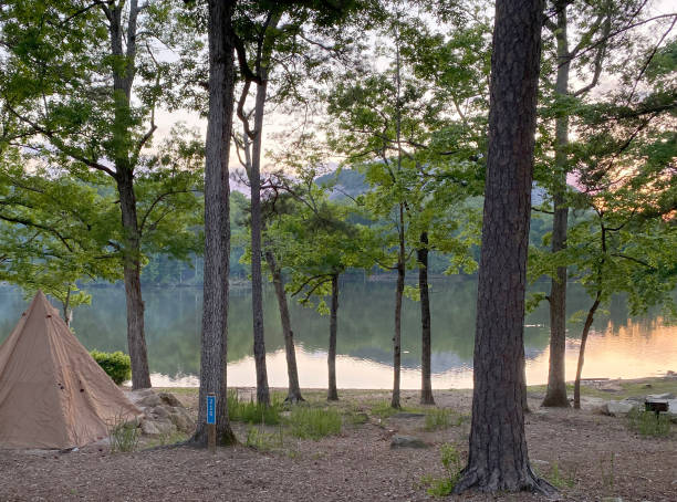 istock Camping by the Lake at Sunset 2165446441