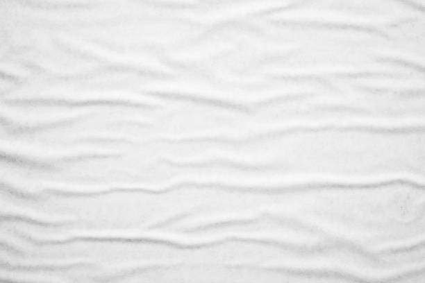 istock white crumpled and creased paper poster texture background 2165449204