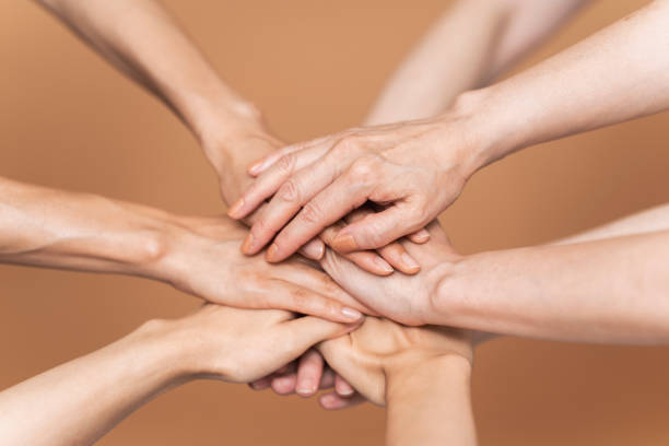 istock Several people are joining hands to deepen their bond 2165450811