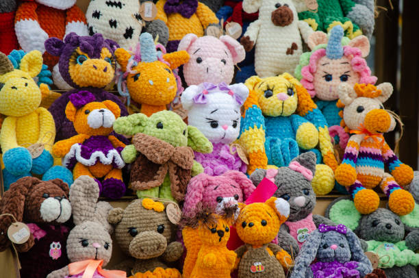 istock Designer soft knitted toys for sale 2165452636