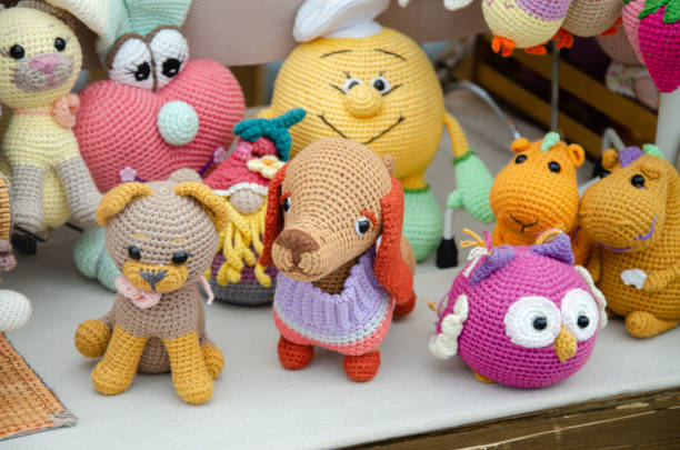 istock Designer soft knitted toys for sale 2165452671