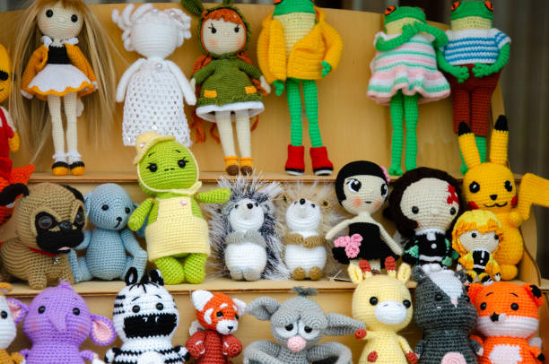 istock Designer soft knitted toys for sale 2165452678