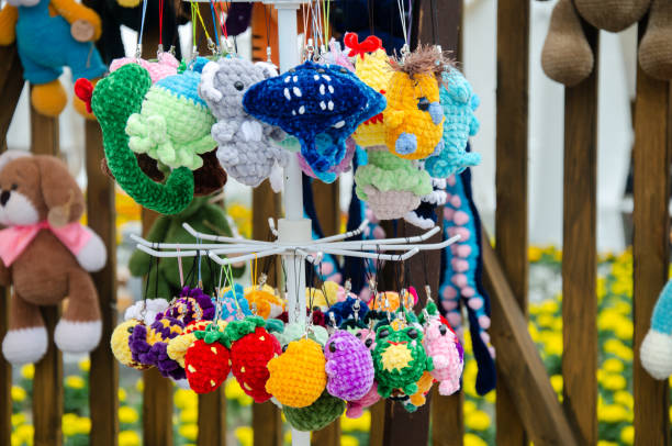 istock Designer soft knitted toys for sale 2165452695