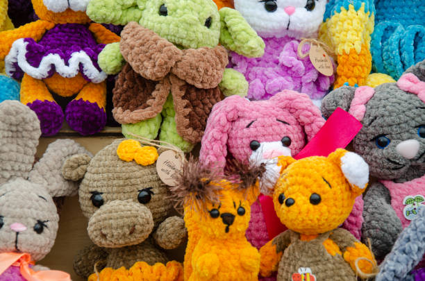 istock Designer soft knitted toys for sale 2165452698