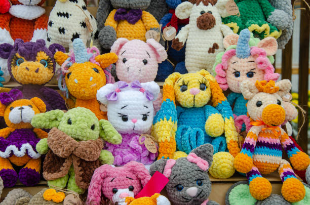 istock Designer soft knitted toys for sale 2165452700
