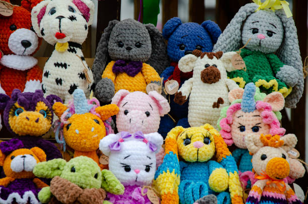 istock Designer soft knitted toys for sale 2165452702
