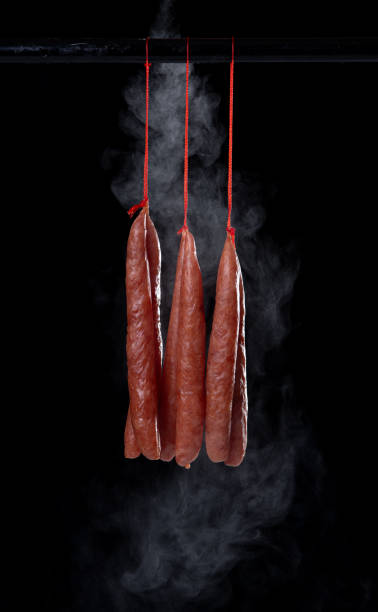 istock Hanging dried Chinese sausage on dark background 2165465654