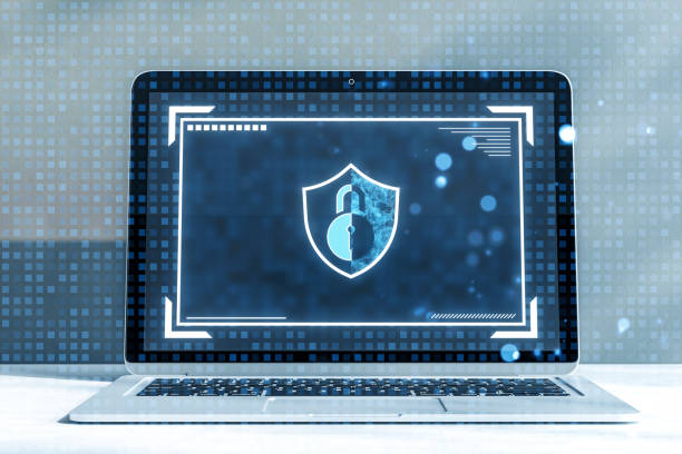 istock Laptop screen displaying shield and lock icon, representing cyber security and data protection concepts. 2165471339