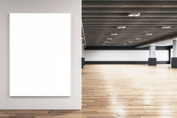 istock Spacious modern hall with blank canvas on wall for advertising. 3D Rendering 2165471390