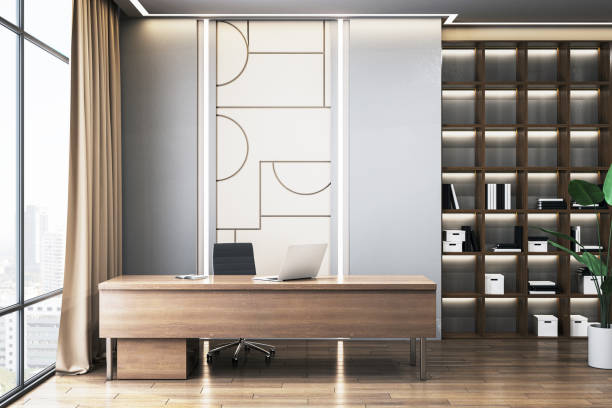 istock Modern office interior with a wooden desk and city view window. 3D Rendering 2165471426