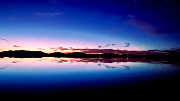 istock big pink clouds in blue sky sunset over White Sands National Park 2165472574