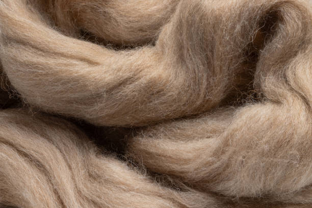 istock Creamy background, natural wool fabric texture. 2165473424