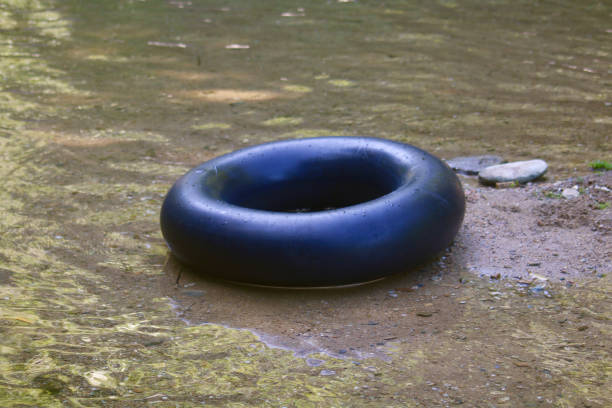 istock Rotary Inner Tube in a lake. 2165475718