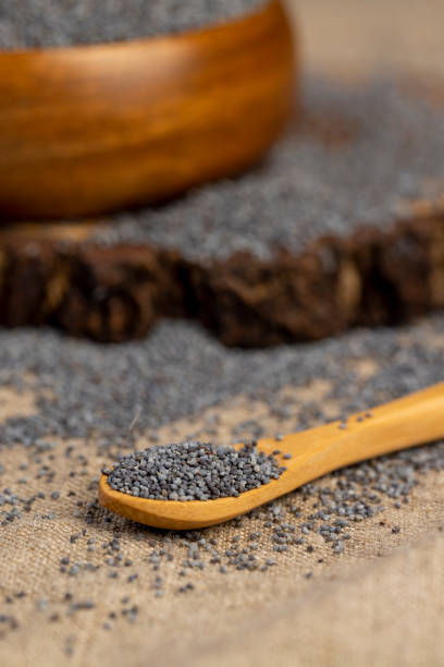 istock scattered poppy seeds for cooking 2165476404