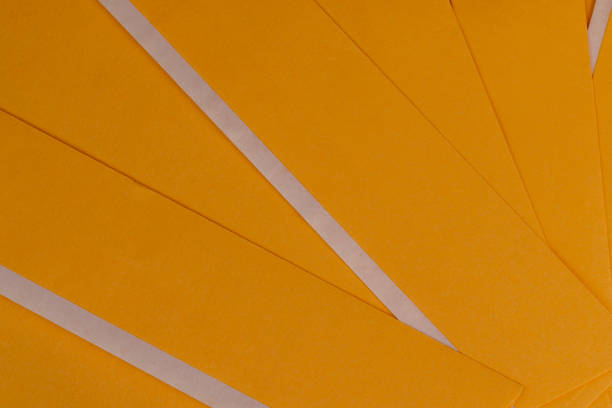 new yellow paper envelopes with an adhesive line, new postal envelopes for which there is a sticky part