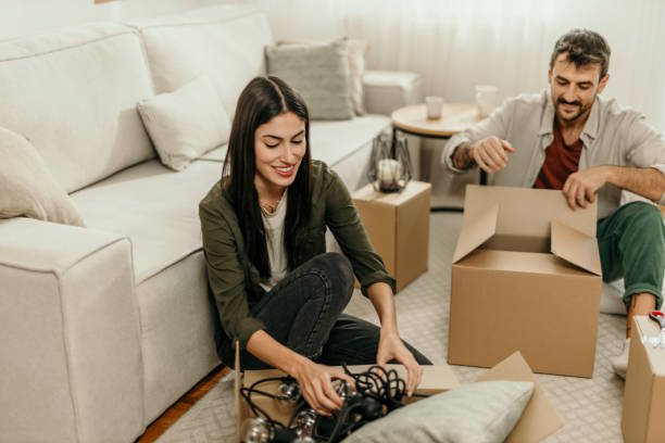 istock Packing up boxes for moving into a new apartment 2165477805