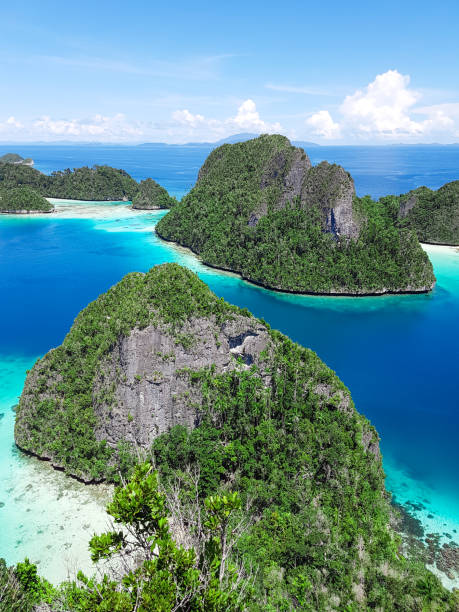 istock Beautiful tropical lagoon and islands with blue sea surface. summer background 2165478532