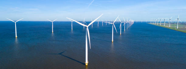 istock Majestic Windmill Park Amidst the Tranquil Waters of the Netherlands 2165478708