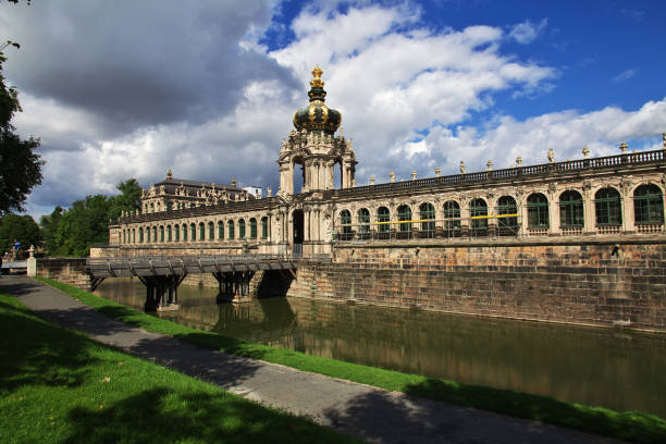 Various views of The Zwinger, in Dresden Germany, and the archeological site currently in progress.  The Zwinger is a palatial complex with gardens in Dresden, Germany. Designed by architect Matthäus Daniel Pöppelmann, it is one of the most important buildings of the Baroque period in Germany. Along with the Frauenkirche, the Zwinger is the most famous architectural monument of Dresden.The name \