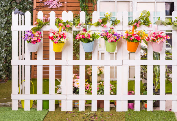 istock Hanging Flower Pots with fence 2165482417