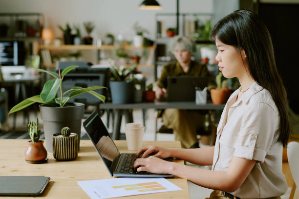istock Asian Woman Working In Biophilic Office 2165483521