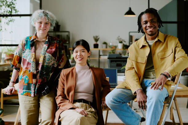 istock Cheerful Gen Z Colleagues Posing For Portrait 2165484326