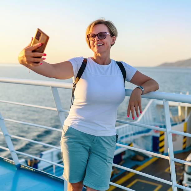 istock A famale tourist on a ferry 2165485873