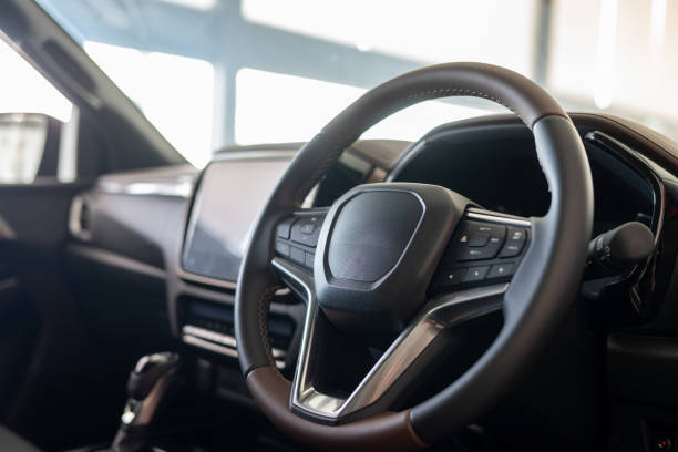 istock View of steering wheel and dashboard inside of modern car 2165486249