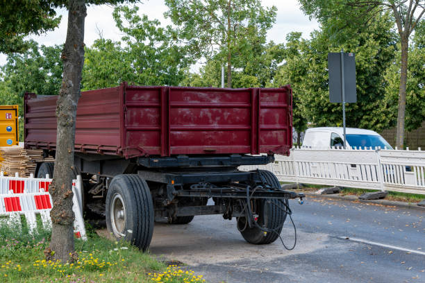 istock A cargo trailer is located at a road repair construction site. 2165489965
