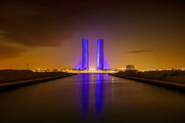 Lusail, Qatar - July 04, 2024: Plaza Tower Lusail Boulevard with Arch Bridge sunset time