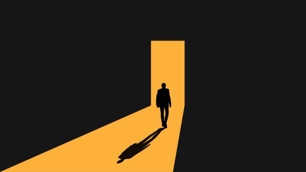 bildbanksillustrationer, clip art samt tecknat material och ikoner med silhouette of businessman entering lit door passage in darkness - ge sig av