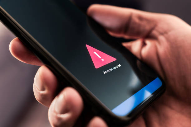 istock Error, problem with connection or phone mobile app. Bad signal in cell device. Broken smartphone. Alert message. Failure notification. Software restart, crash or overheating issue. 2165494410