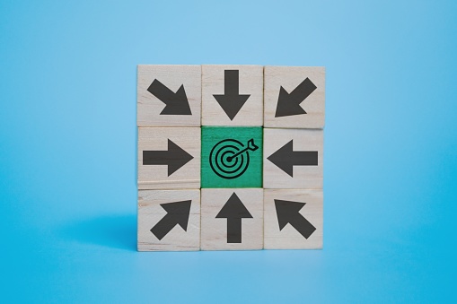 Wooden Blocks Target A Stack Of Wooden Blocks With Various Arrows Pointing Towards A Target ...