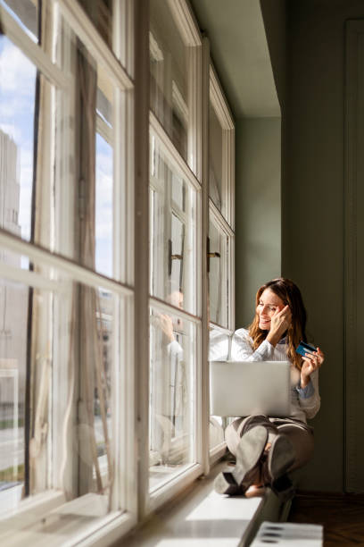 istock Businesswoman Using Laptop 2165494773