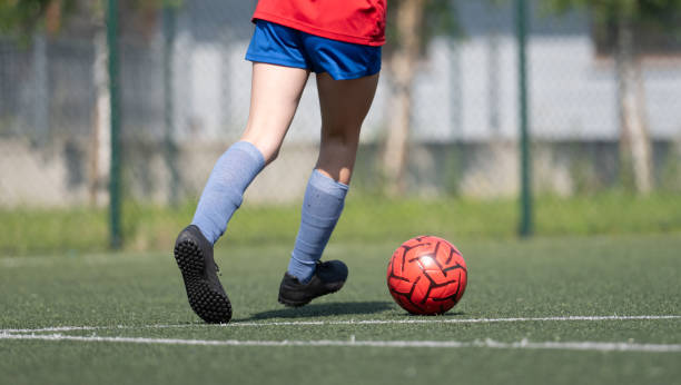 istock Girl Dribbles Ball Between Flip Cups 2165505142