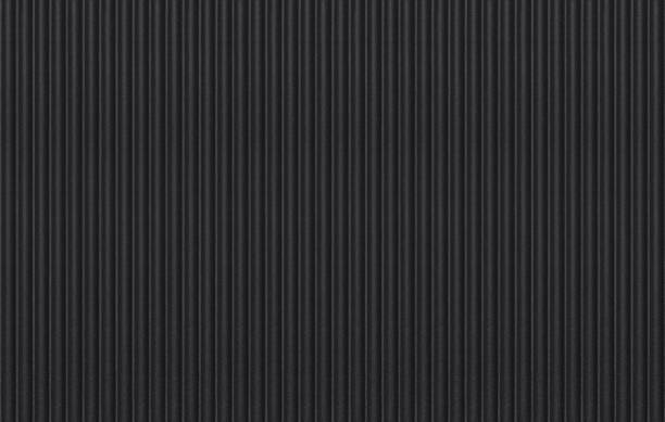 Black corrugated stripped metal ridge background