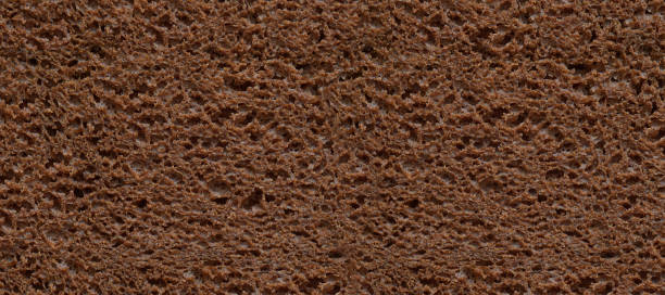 istock brown tommy crumb abstract background of black bread 2165514653