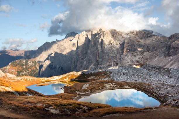 Clear turquoise water of alpine lakes Piani in the Tre Cime Di Laveredo National Park, Dolomites, Italy