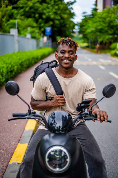 istock Joyful African American Man on Motorcycle 2165519268