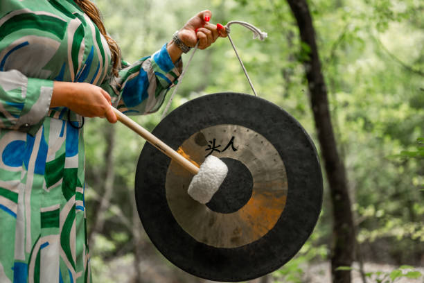 An asian gong with beater. Zen meditation background.