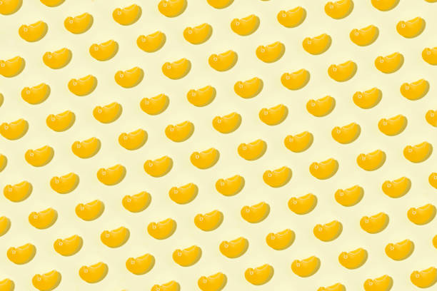 Italian pasta on yellow background
