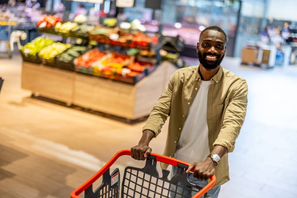 istock Joyful Shopper at Grocery Store 2165522201