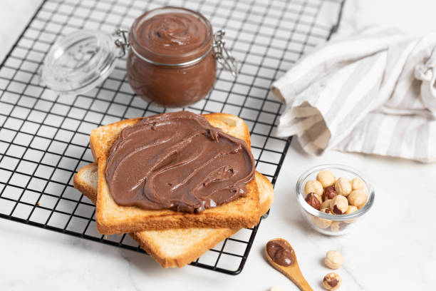 istock fresh toasts with chocolate paste serve on table for delicious breakfast 2165524303
