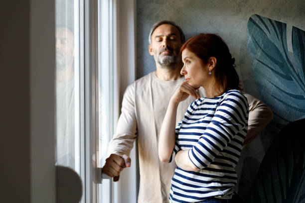 istock Mature couple fighting at home sitting on the sofa. 2165527855
