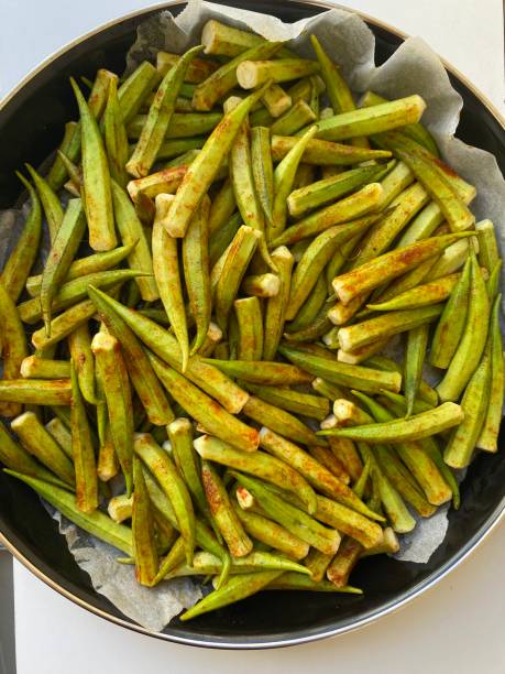 istock Spiced okra placed on a tray for baking 2165529070